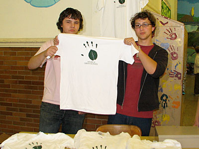 Students selling Green School T-shirts